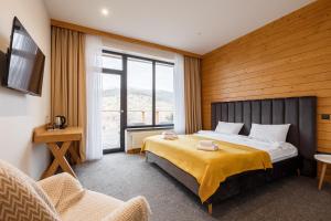 Postel nebo postele na pokoji v ubytování Yo Hotel