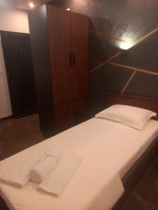 Voodi või voodid majutusasutuse Nego apartmani toas