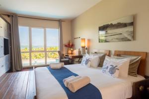 Letto o letti in una camera di Emeraude Villas - Bay