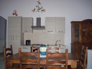 Kuchyň nebo kuchyňský kout v ubytování B&B La Taverna