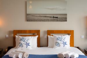 Letto o letti in una camera di Emeraude Villas - Bay