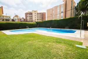 Bazén v ubytování Sol Montemar 10 by IVI Real Estate nebo v jeho okolí
