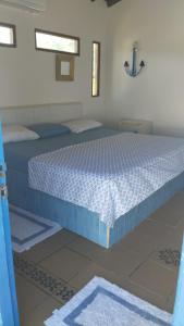 Giường trong phòng chung tại Luna del Mar