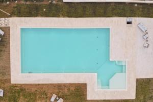 Der Swimmingpool an oder in der Nähe von La volpe e l'uva Dimore