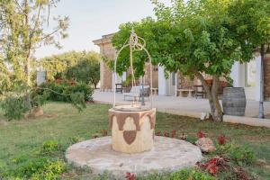 Ein Garten an der Unterkunft La volpe e l'uva Dimore