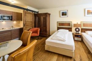 Ένα ή περισσότερα κρεβάτια σε δωμάτιο στο Art Apartments Sievering