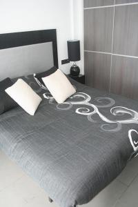 Postel nebo postele na pokoji v ubytování Apartment OasisBeach La Zenia