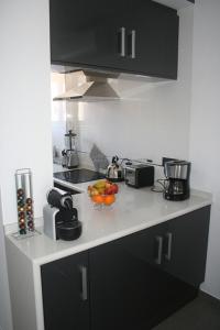 Kuchyň nebo kuchyňský kout v ubytování Apartment OasisBeach La Zenia