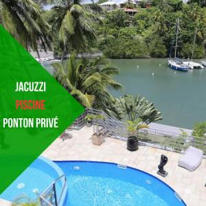 Vaade basseinile majutusasutuses Villa Evasion, piscine jacuzzi et ponton privé või selle lähedal
