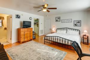 a bedroom with a bed and a ceiling fan at Pet-Friendly Nashville Home about 4 Mi to Airport! in Nashville