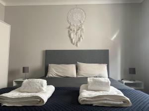 Ένα ή περισσότερα κρεβάτια σε δωμάτιο στο Casa Pescador