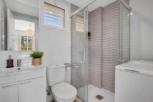 Kúpeľňa v ubytovaní Vistamarina A108 by IVI Real Estate