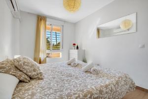 Posteľ alebo postele v izbe v ubytovaní Vistamarina A108 by IVI Real Estate