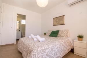 Posteľ alebo postele v izbe v ubytovaní Vistamarina A108 by IVI Real Estate