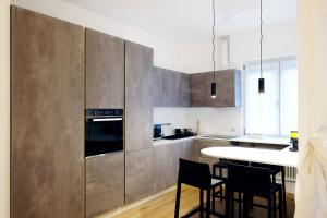Kuchyň nebo kuchyňský kout v ubytování Residenza IL cavaliere del Borgo d'oro Bergamo