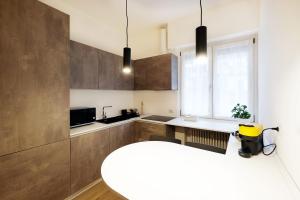 Kuchyň nebo kuchyňský kout v ubytování Residenza IL cavaliere del Borgo d'oro Bergamo