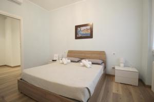 Postel nebo postele na pokoji v ubytování Villa Giulini Rho