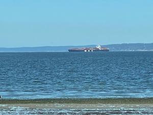 a large ship in the middle of the ocean at BOATYARRD Inn # 9 in Langley