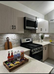A kitchen or kitchenette at JustFun Home, Discovery Bay, St Ann Jamaica