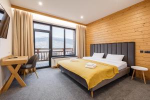 Postel nebo postele na pokoji v ubytování Yo Hotel