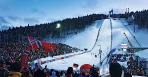 a large crowd of people watching a ski slope at Ski & Bike apartment Bublava in Bublava