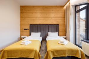 Кровать или кровати в номере Yo Hotel