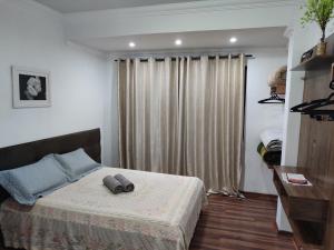 Aconchegante Apartamento em Ouro Preto客房内的一张或多张床位