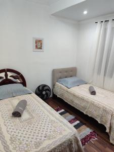 Aconchegante Apartamento em Ouro Preto客房内的一张或多张床位