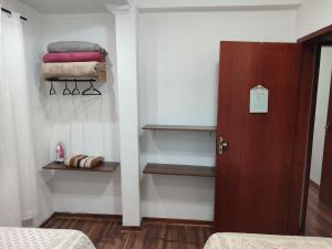 Aconchegante Apartamento em Ouro Preto客房内的一张或多张床位