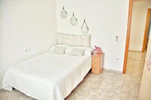 Postel nebo postele na pokoji v ubytování Apartamento Playa Xilxes