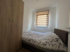 Postel nebo postele na pokoji v ubytování Deluxe NS