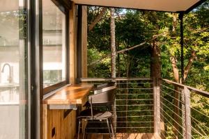 Svalir eða verönd á Tiny Home Samambaia - Sea view and bathtub