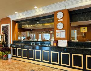 a fast food restaurant with clocks on the wall at Garden Suite Hotel and Resort in Los Angeles