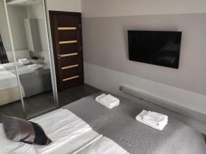 Posteľ alebo postele v izbe v ubytovaní San Marino