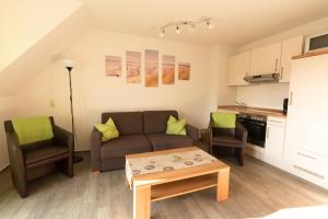 Η κουζίνα ή μικρή κουζίνα στο Dat Ferienhus Norddeich Ferienwohnung 5