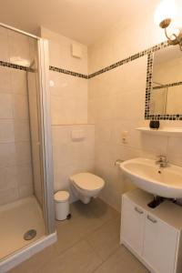 Ένα μπάνιο στο Dat Ferienhus Norddeich Ferienwohnung 6