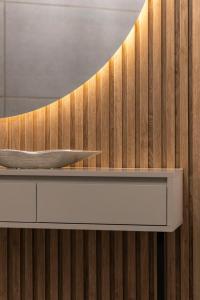 a wooden wall with a counter and a knife on it at Luxurious & Spacious Central Residence with Balcony in Budapest