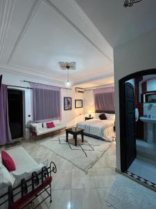 Postel nebo postele na pokoji v ubytování Paradise house