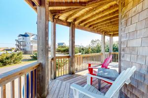 a deck with two chairs and a table at Floyd's Retreat in Salvo