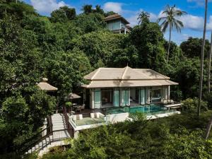 an aerial view of a villa with a swimming pool at Banyan Tree Samui in Lamai