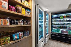 a refrigerator filled with lots of food and drinks at Sonesta ES Suites Denver South Park Meadows in Lone Tree