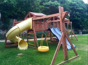 a play set with a slide and a slideintend at Private Room Puerto Morelos in Puerto Morelos