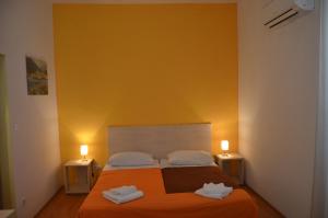 Postel nebo postele na pokoji v ubytování Hotel Borik
