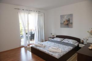 Posteľ alebo postele v izbe v ubytovaní Holiday house with a parking space Podstrana, Split - 6044