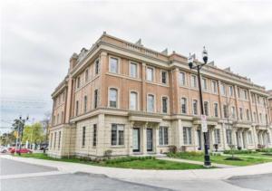 a large brick building on the corner of a street at Immaculate Executive Townhouse 3Br&3Ba at Lawrence Park in Toronto