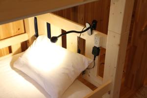 A bed or beds in a room at Hostel Fish in a River