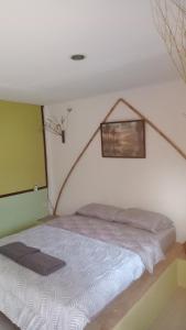 Postel nebo postele na pokoji v ubytování navaa Bungalow
