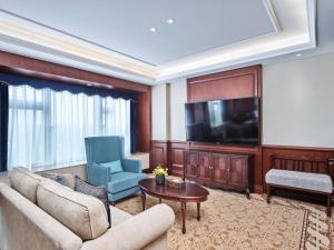 TV o dispositivi per l'intrattenimento presso Guangming CIMC Executive Hotel Shenzhen