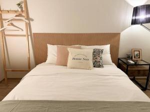 Ένα ή περισσότερα κρεβάτια σε δωμάτιο στο Athome - Foreigner Only