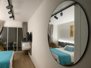 Letto o letti in una camera di Diamantchery - Vue mer avec Deck privatif